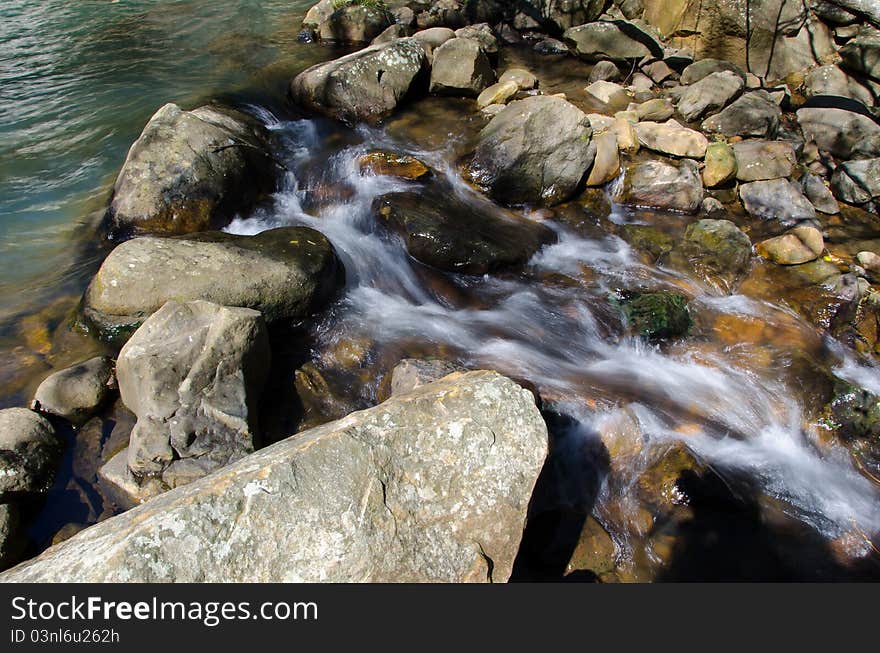 Trace the descent of the river, nature