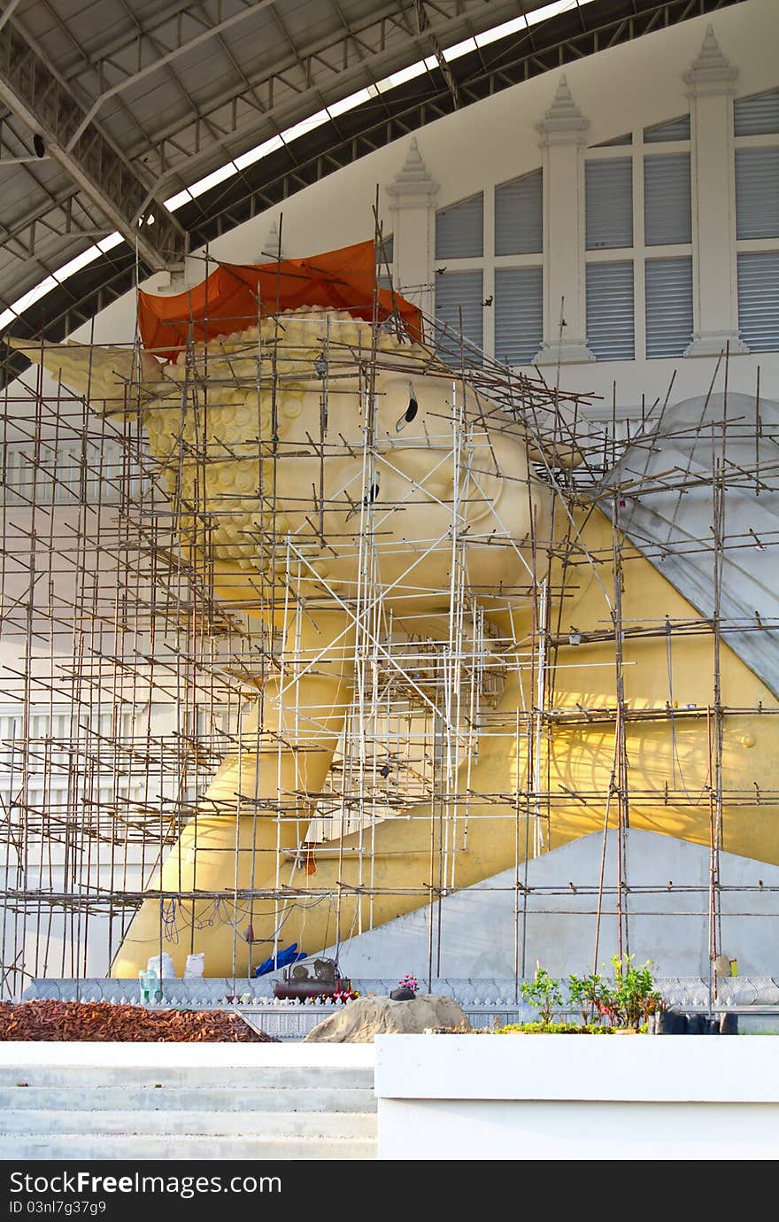 A large reclining Buddha in the hall. A large reclining Buddha in the hall.