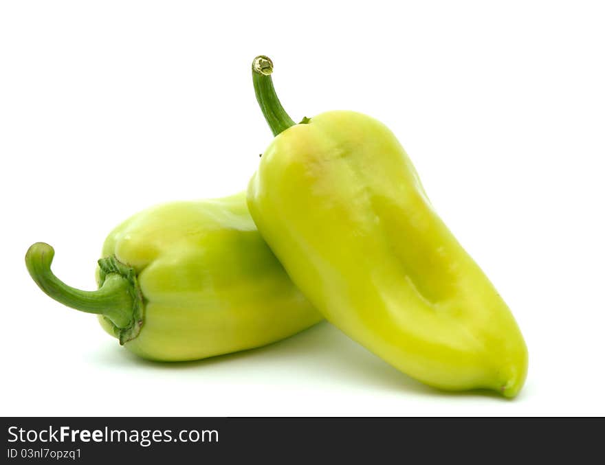 Green peppers on a white background