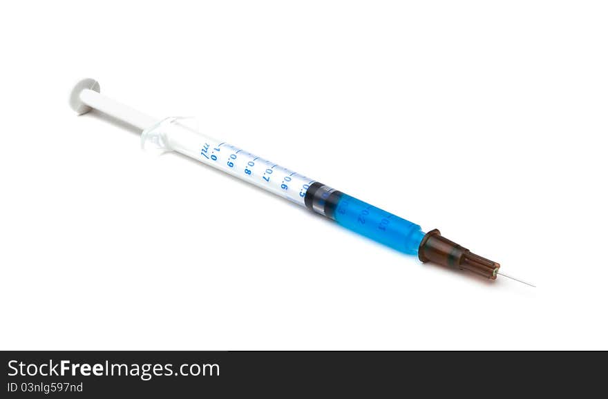 Medical syringe with blue liquid. Medical syringe with blue liquid.