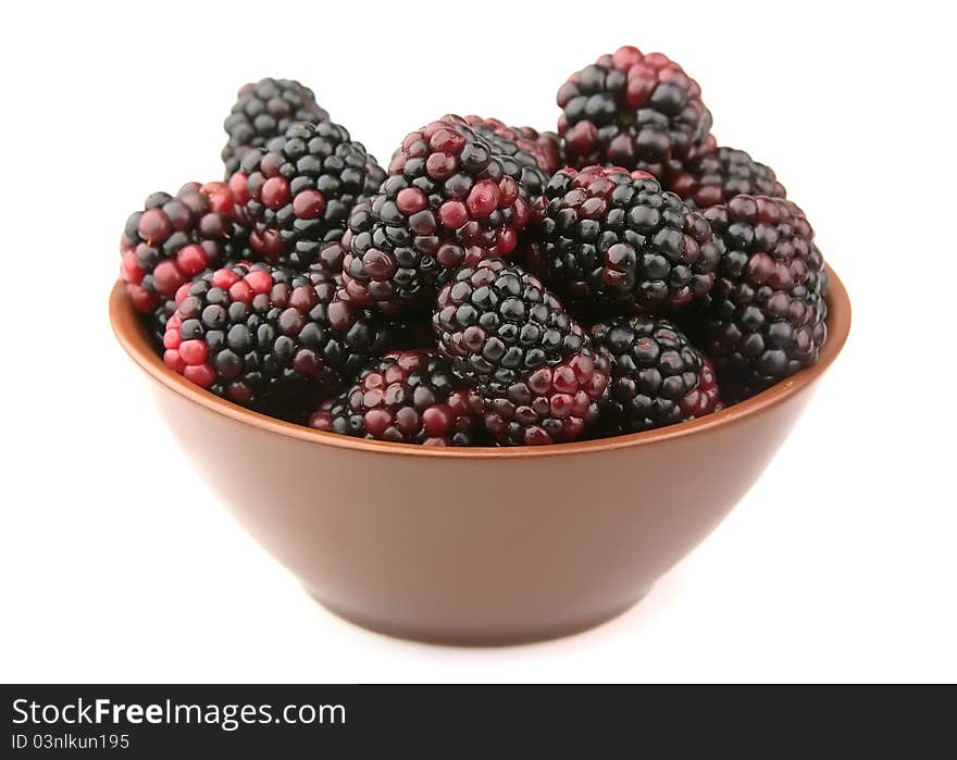 Ripe blackberry in a plate