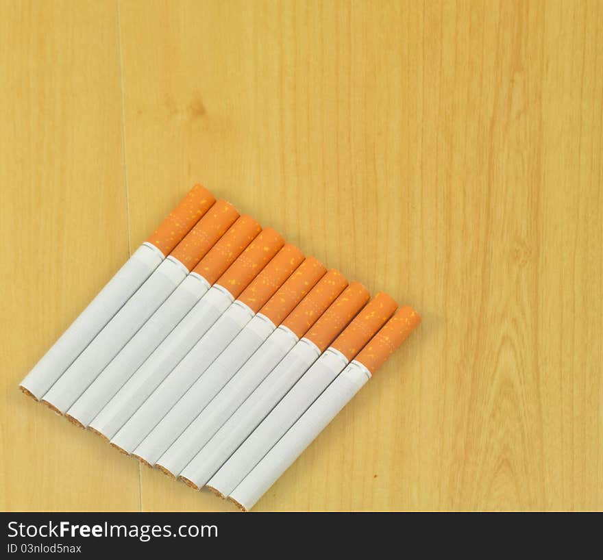 Some cigarettes laid out on a table