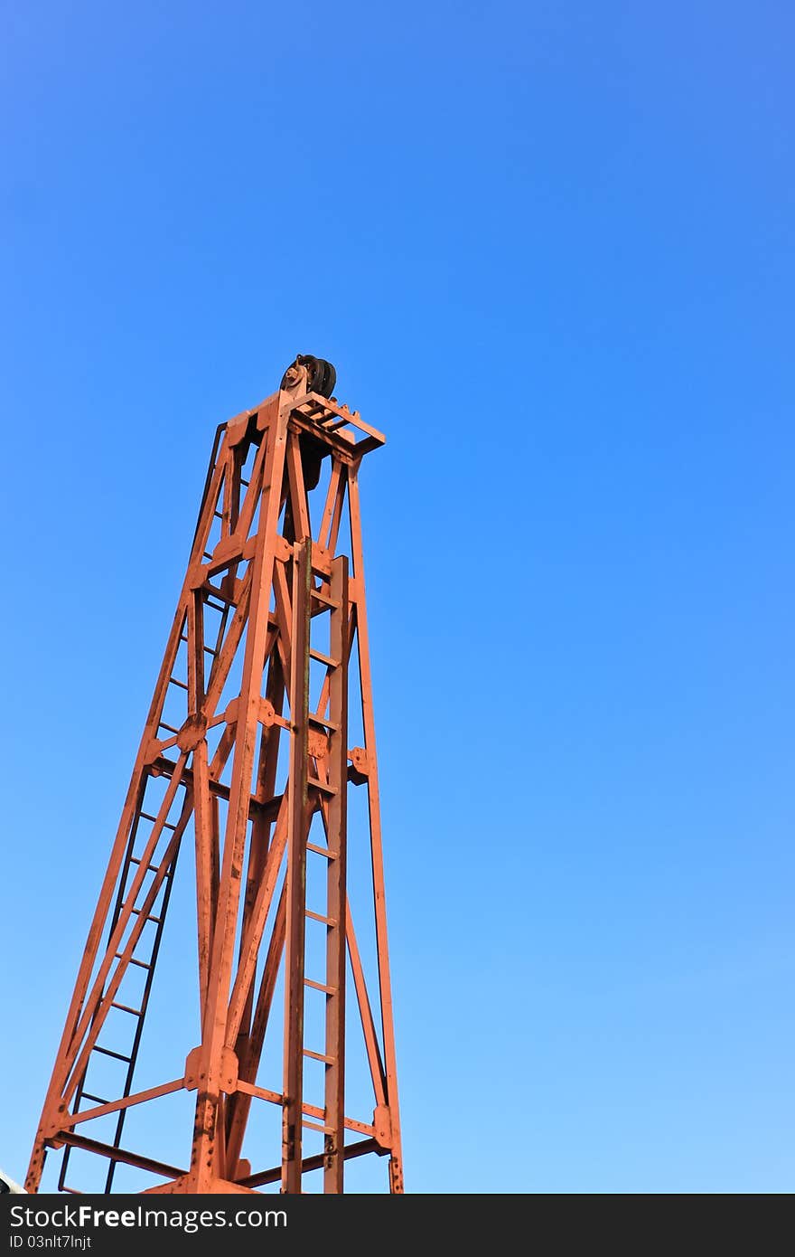 Pulley against nice blue sky. Pulley against nice blue sky