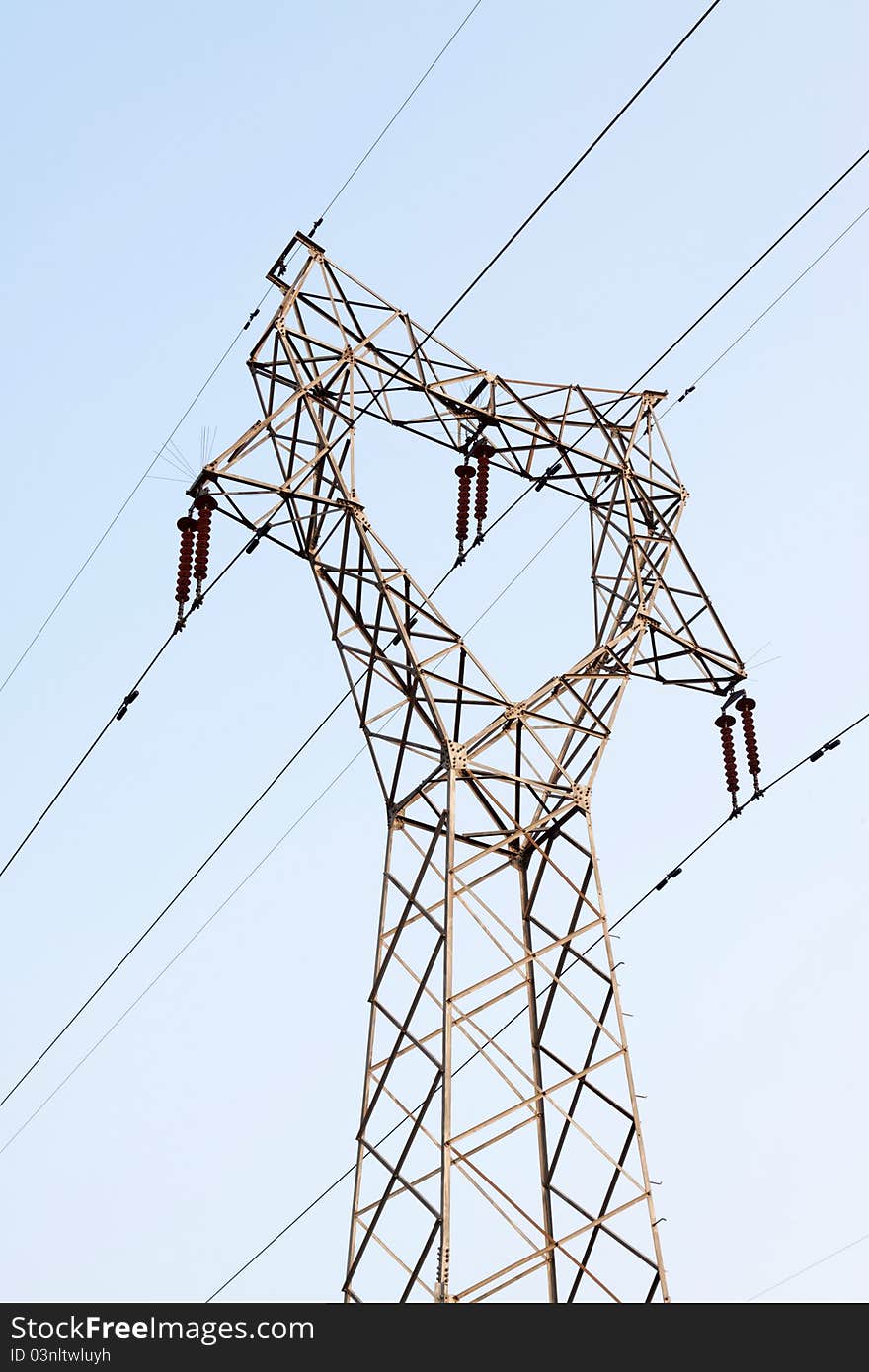 Electric tower in the blue sky, steel power transmission facilities, HeBei, North China.