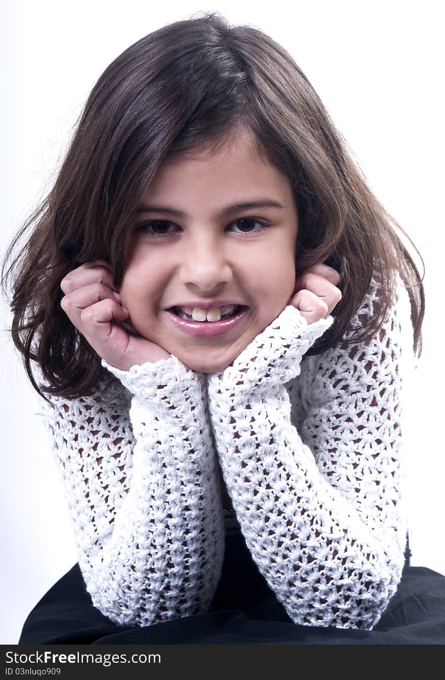 Young Brazilian girl with head in hands. Young Brazilian girl with head in hands