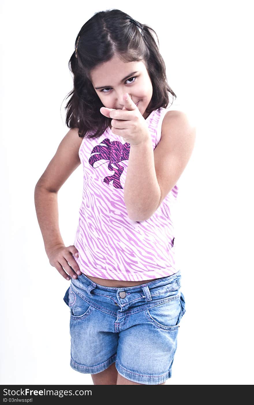 Young Brazilian girl pointing forward. Young Brazilian girl pointing forward