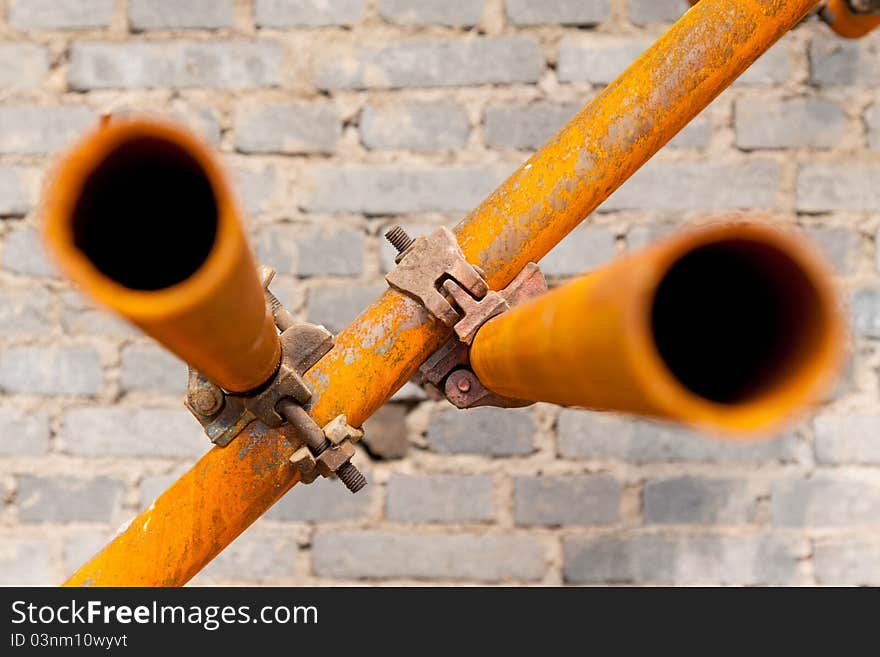 Closeup of rusty scaffold in a construction site