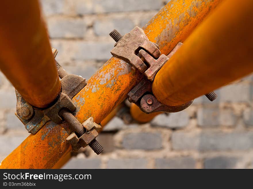 Closeup of rusty scaffold in a construction site