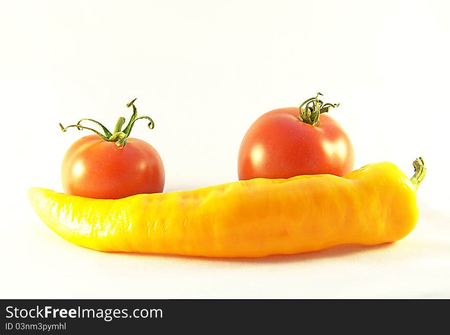 Red tomatos and yellow pepper