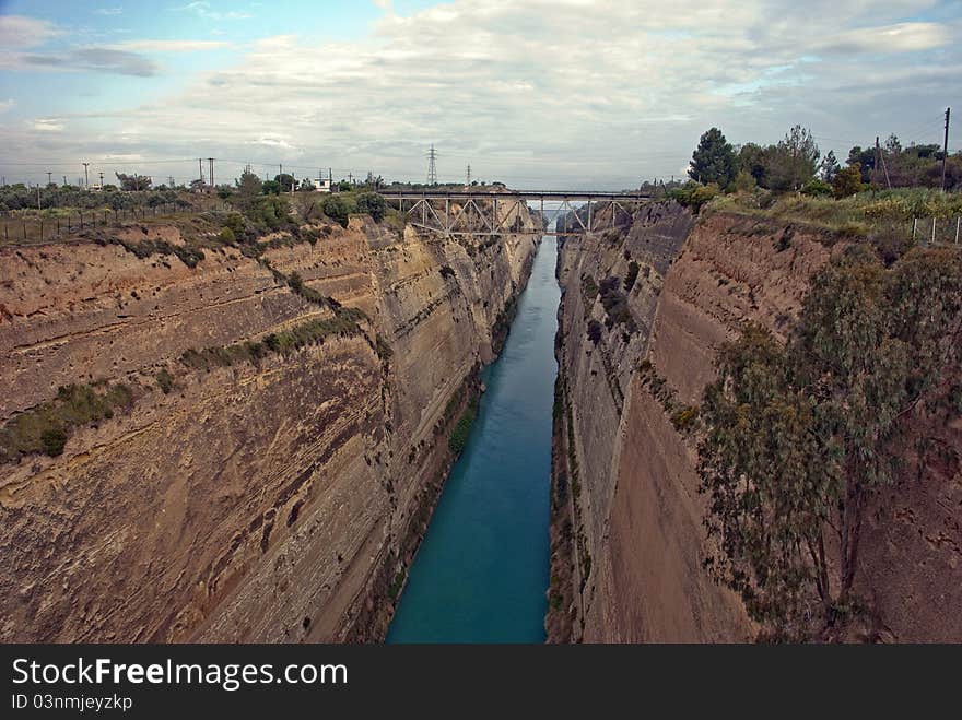 A canal that connects the Gulf of Corinth with the Saronic Gulf in the Aegean Sea. A canal that connects the Gulf of Corinth with the Saronic Gulf in the Aegean Sea.