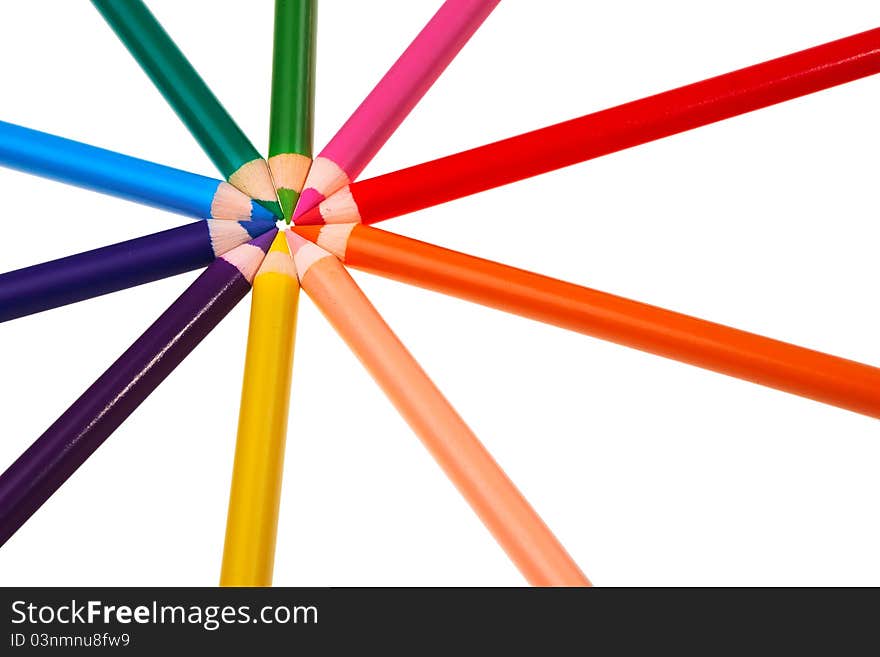 Colorful wooden crayons isolated over white background. Colorful wooden crayons isolated over white background.