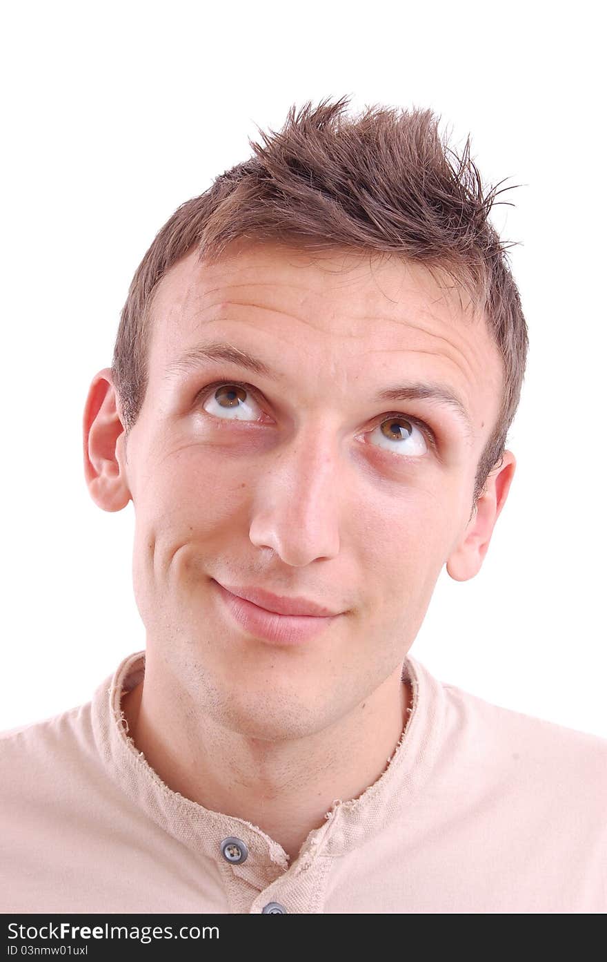 Portrait of a young man looking at something above his head, isolated on white. Portrait of a young man looking at something above his head, isolated on white