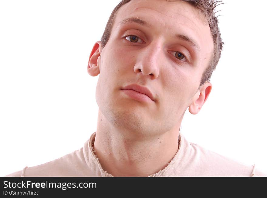 Portrait of a casual young man looking into the camera, isolated on white