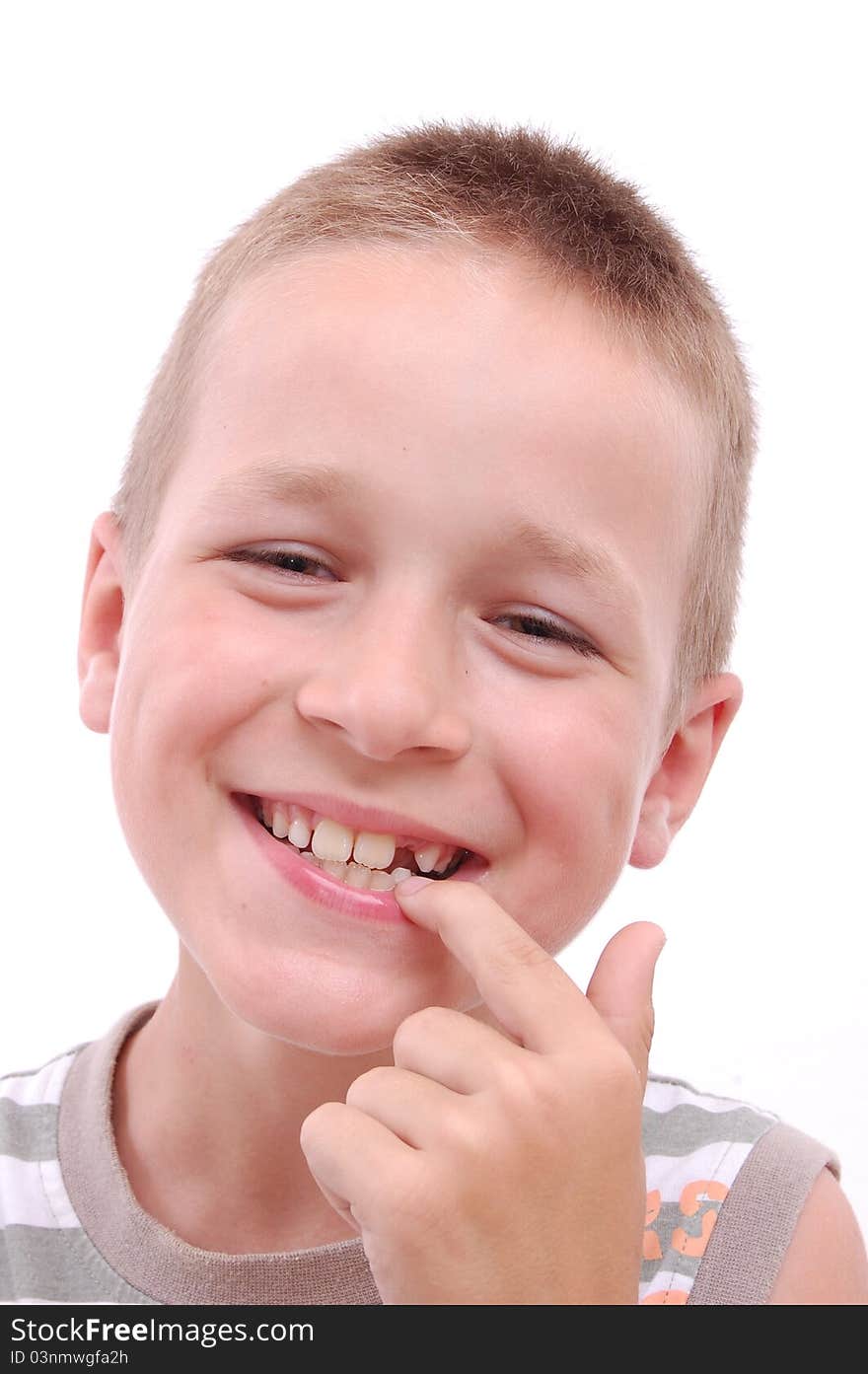 Portrait of a smiling boy showing his missing tooth, isolated on white. Portrait of a smiling boy showing his missing tooth, isolated on white