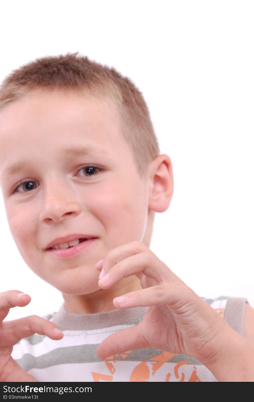 Portrait of a scared little boy, isolated on white