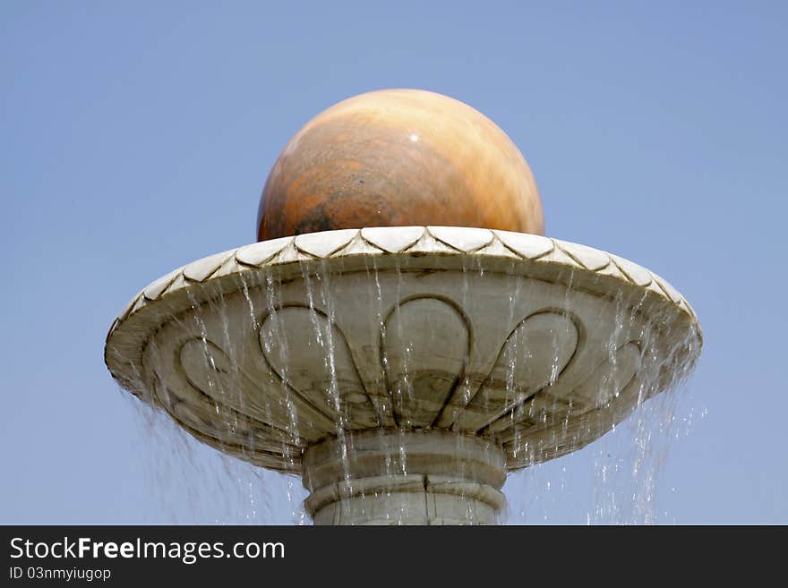 Revolving stone ball