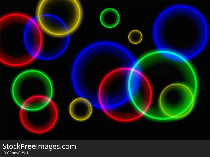 Bright beautiful concentric circles on a black background