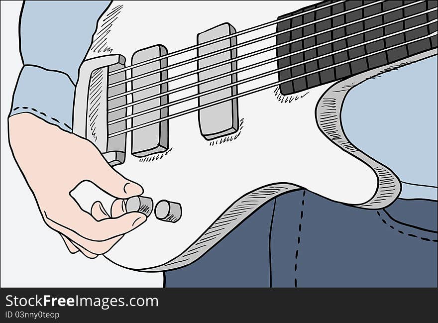 Closeup of man tuning guitar