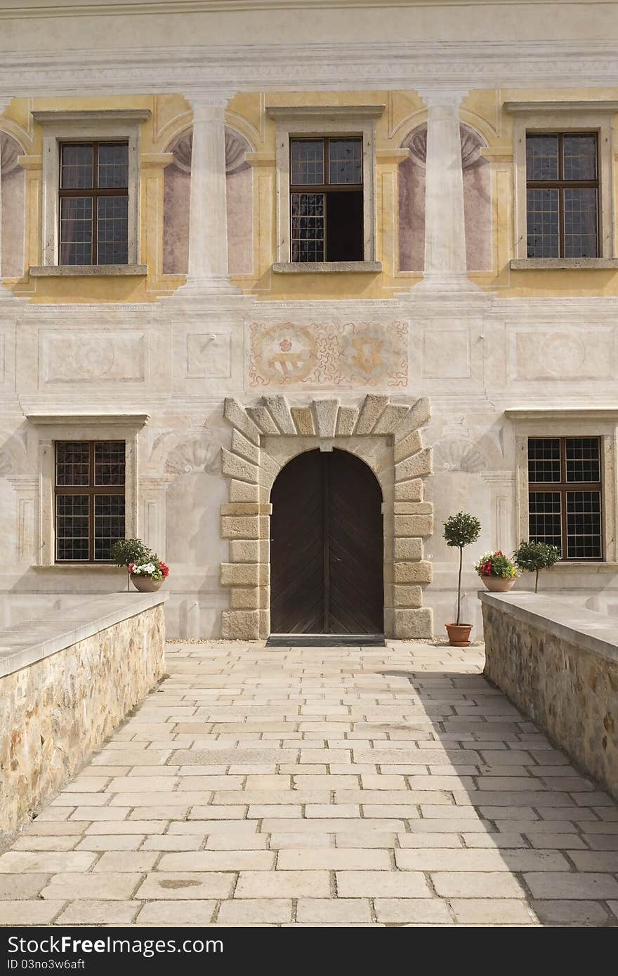 Stone bridge and the entrance to the castle (State Renaissance chateau Kratochvile, Czech Republic)