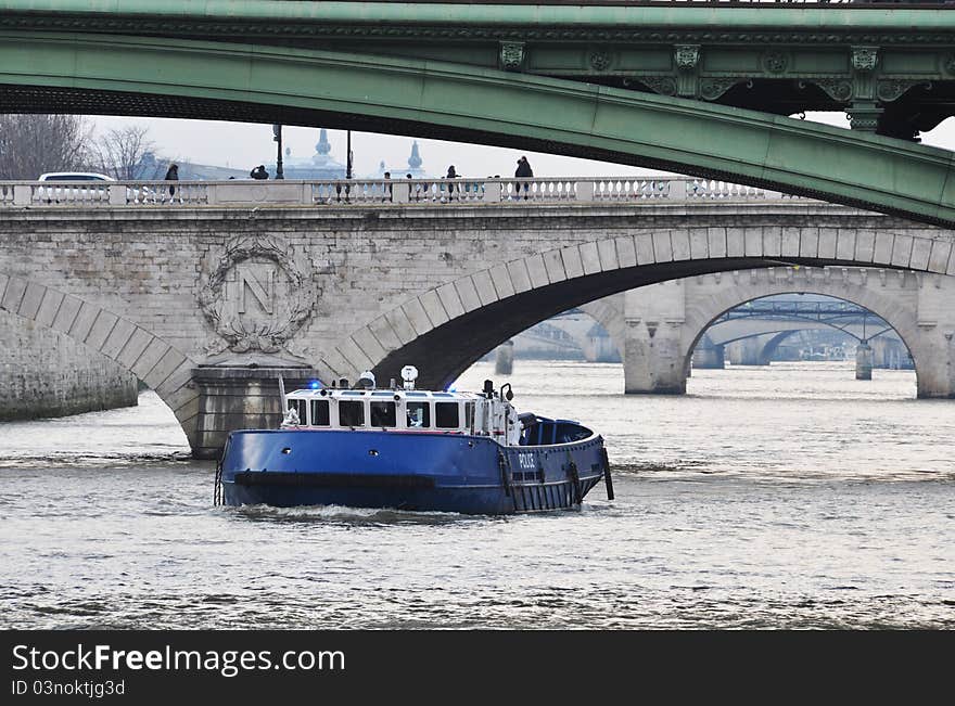 French police boat on the river Seine, Paris, France