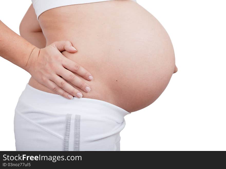 Pregnant woman hold hands on a belly isolated