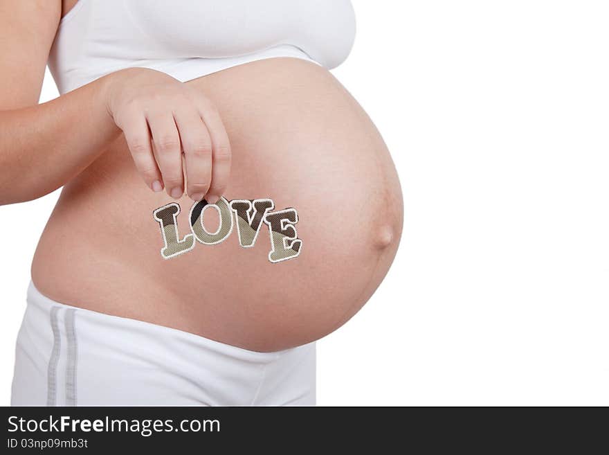 Pregnant woman hold word love on in hands on white background. Pregnant woman hold word love on in hands on white background