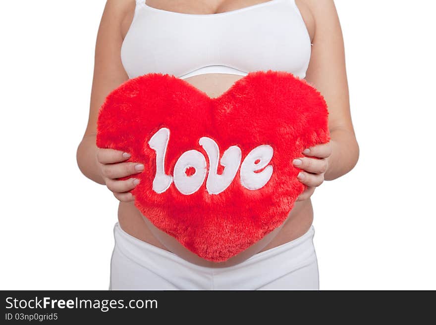 Pregnant woman hold red hart with love in hands on white background