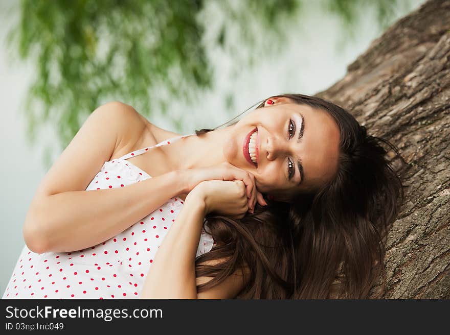 Woman in the park. Smiling