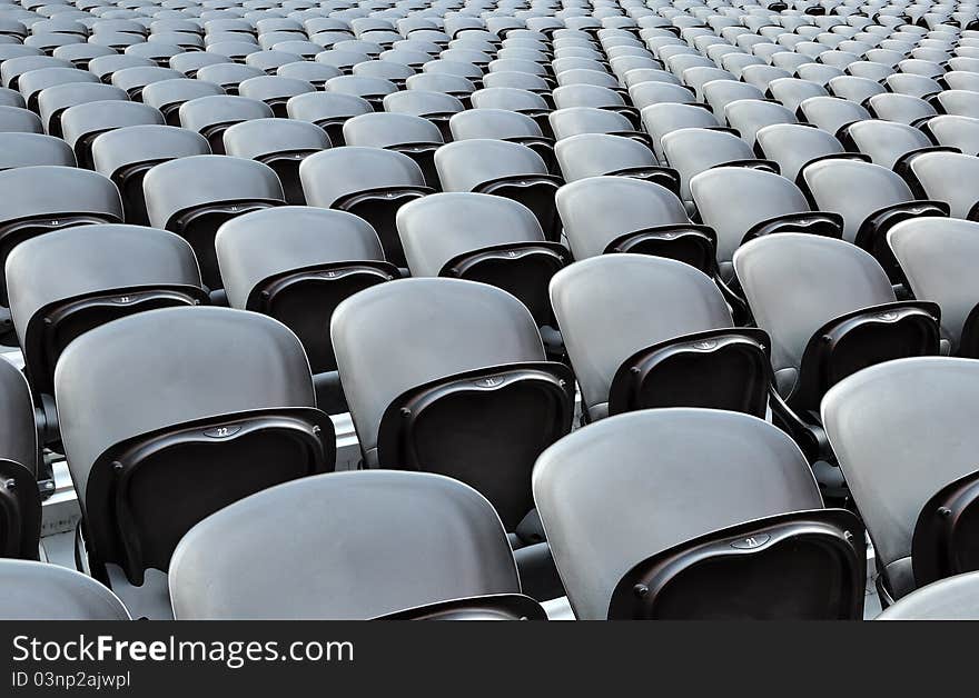 A rows black seats on the stadion. The Donbass Arena (Donetsk, Ukraine) is the first stadium in Eastern Europe designed and built to UEFA elite standards. Arena for semifinals Euro-2012.