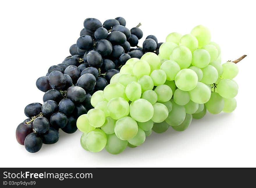 Bunches of black and green grapes isolated on white background