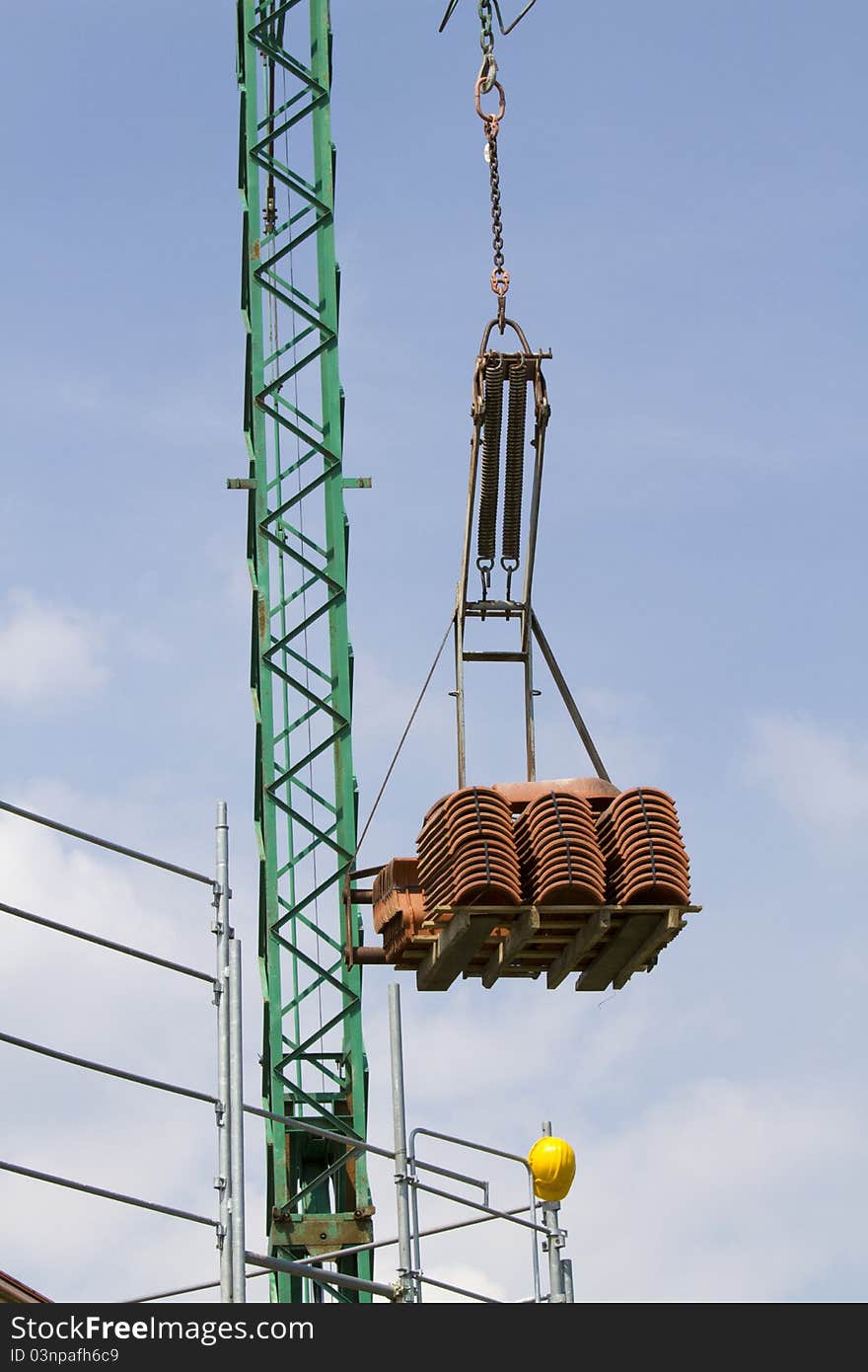 Detail of a crane for roof renovation