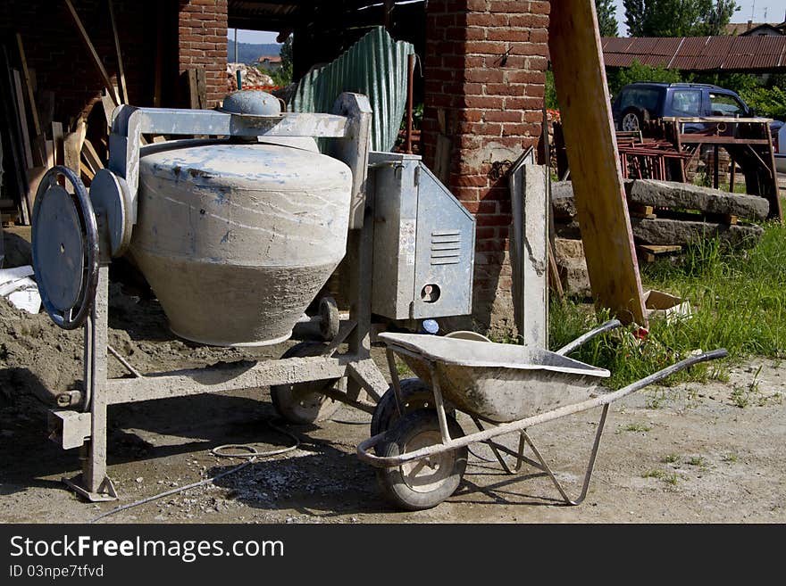 Details of a construction site with cement mixe