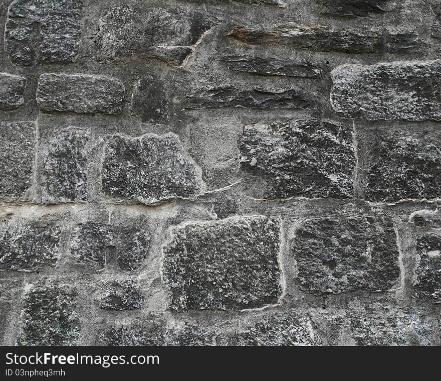 Closeup of stone wall use for construction business and designers (Textures)