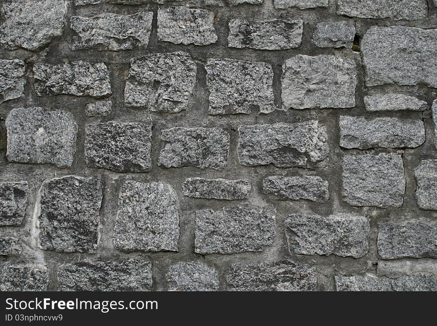 Closeup of stone wall use for construction business and designers (Textures)