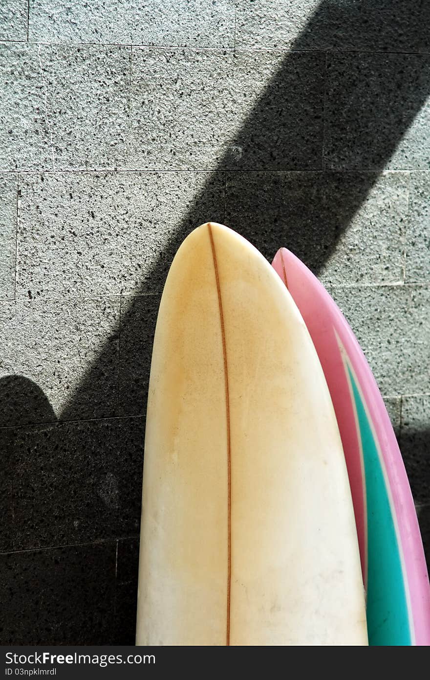 Two surfboard standing on empty wall. Two surfboard standing on empty wall