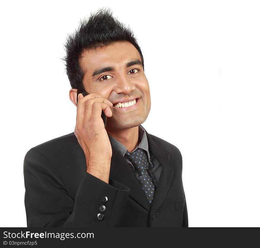 Young arabic businessman talking on the phone