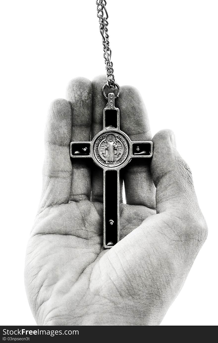 Relgious Cross Necklace In Male Hand. Relgious Cross Necklace In Male Hand