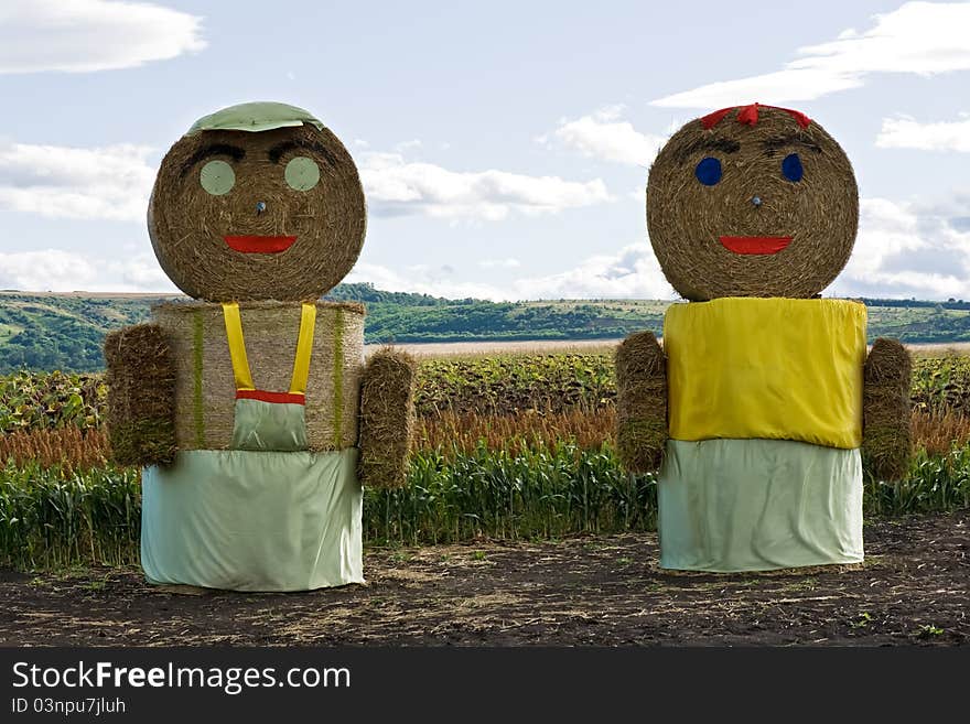 Straw Couple Staying On The Field