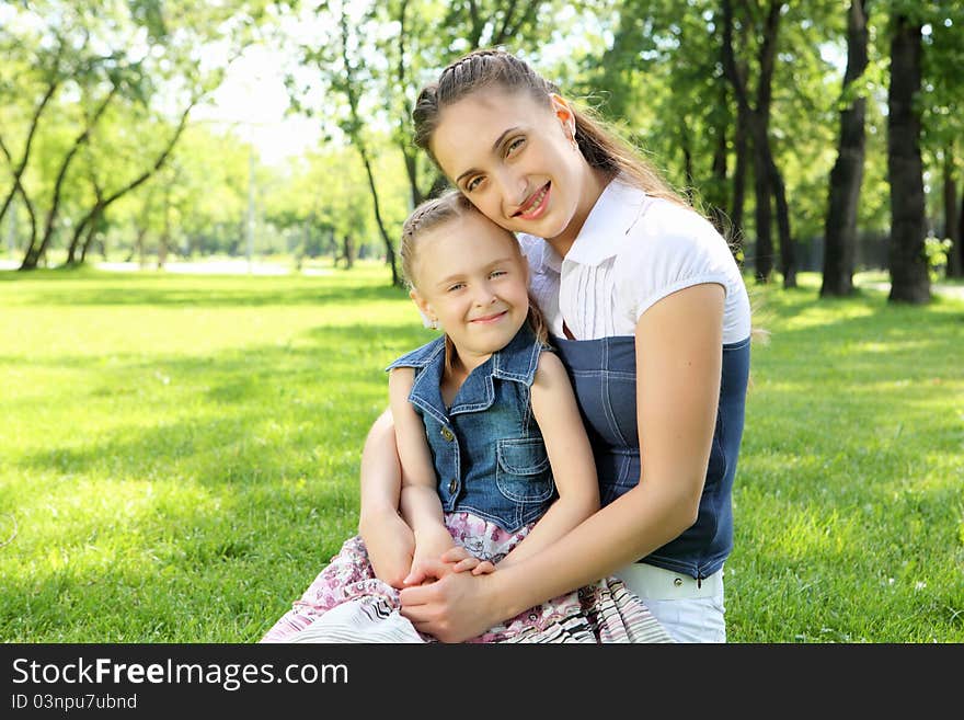 Mother with her daughter outside