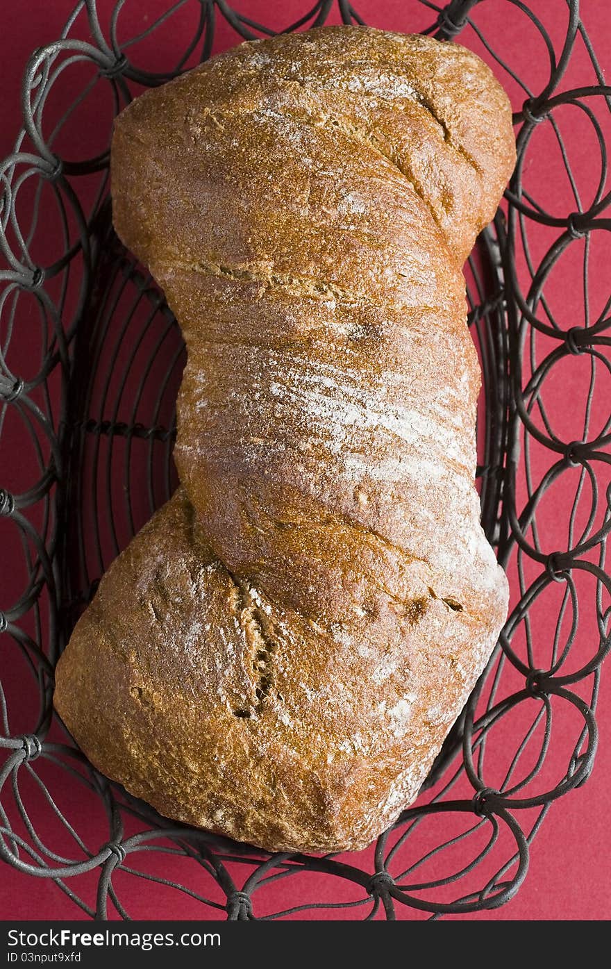 Loaf of italian bread over color background. Loaf of italian bread over color background