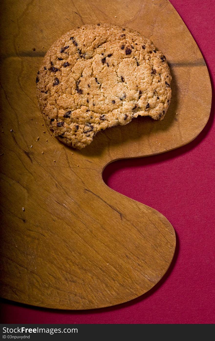 Chocolate cookie over on a cutting board