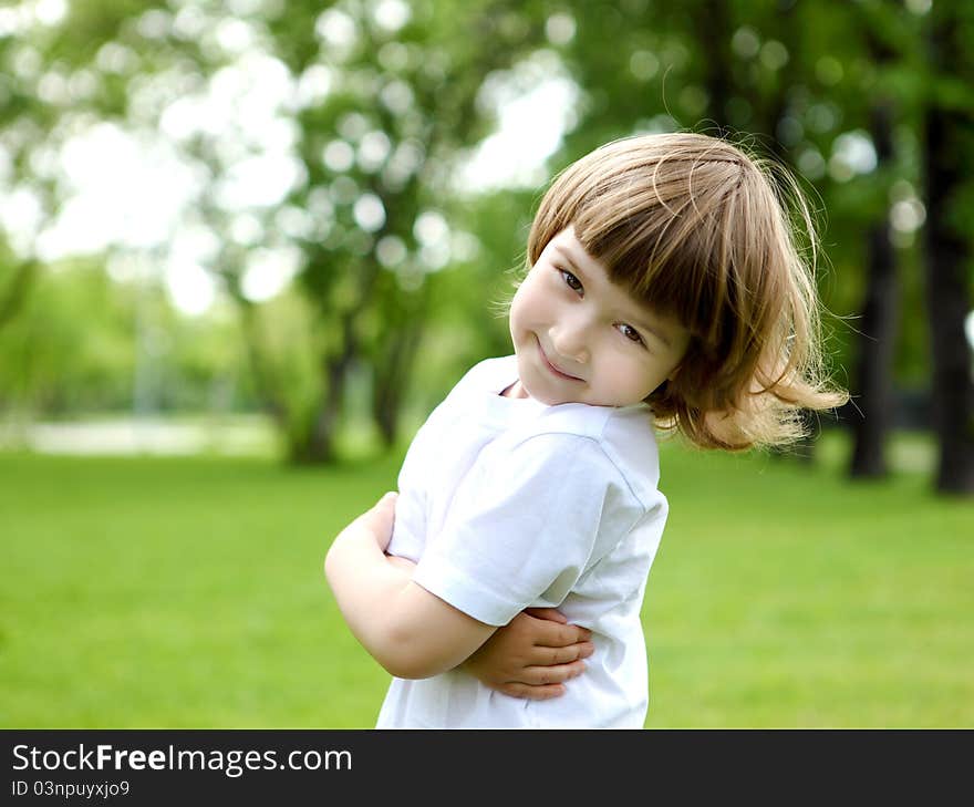 Portrait of a little girl outdoors