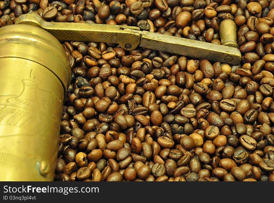 Coffee grinder with fine grains of freshly baked coffee