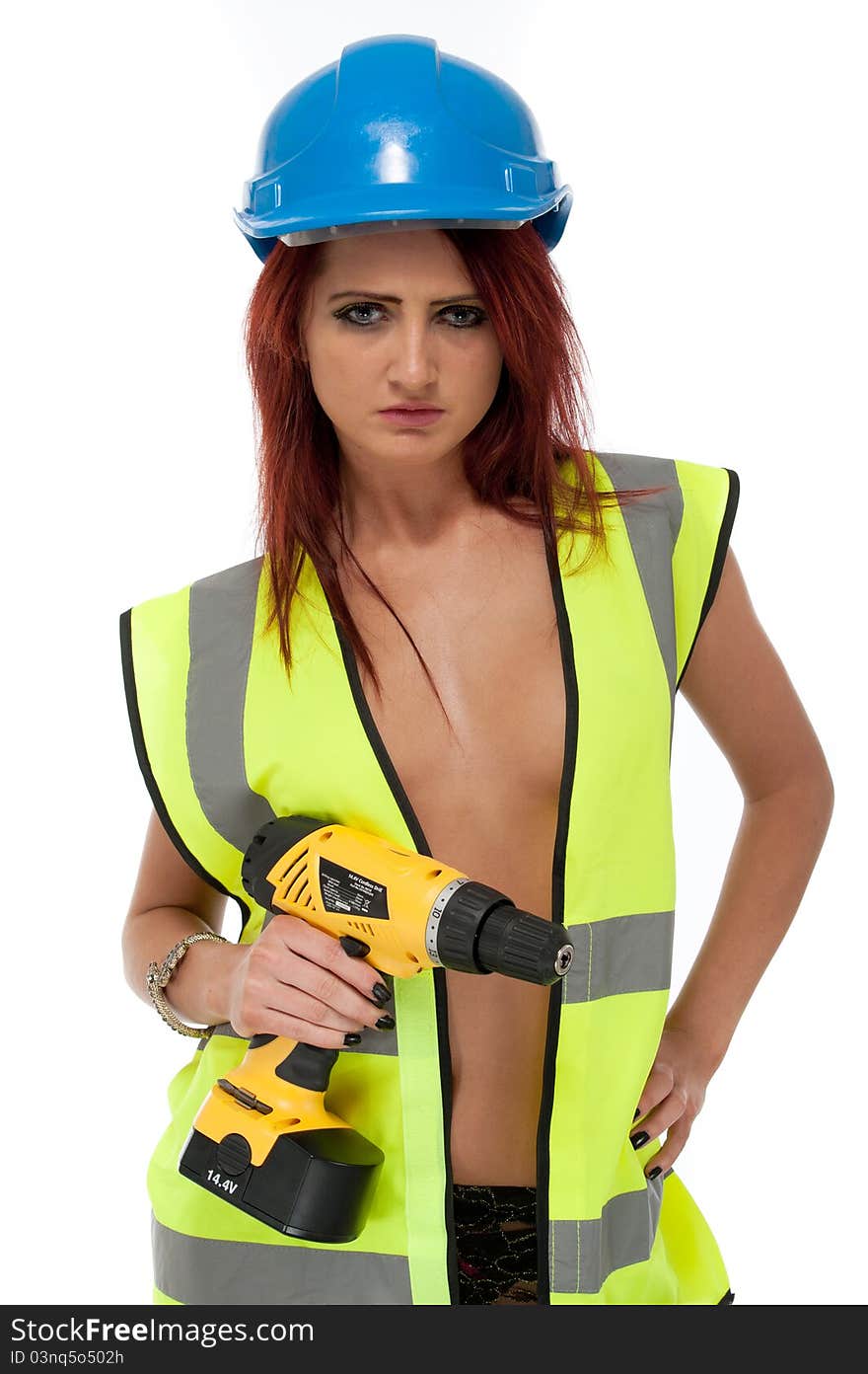 Sexy girl in hi vis jacket isolated and hard hat w