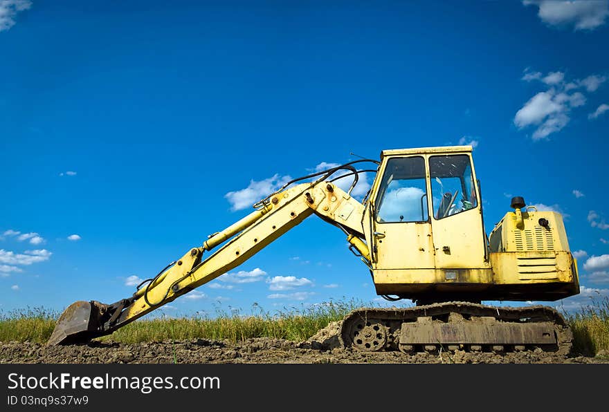 Digger, Heavy Duty construction equipment parked at work site