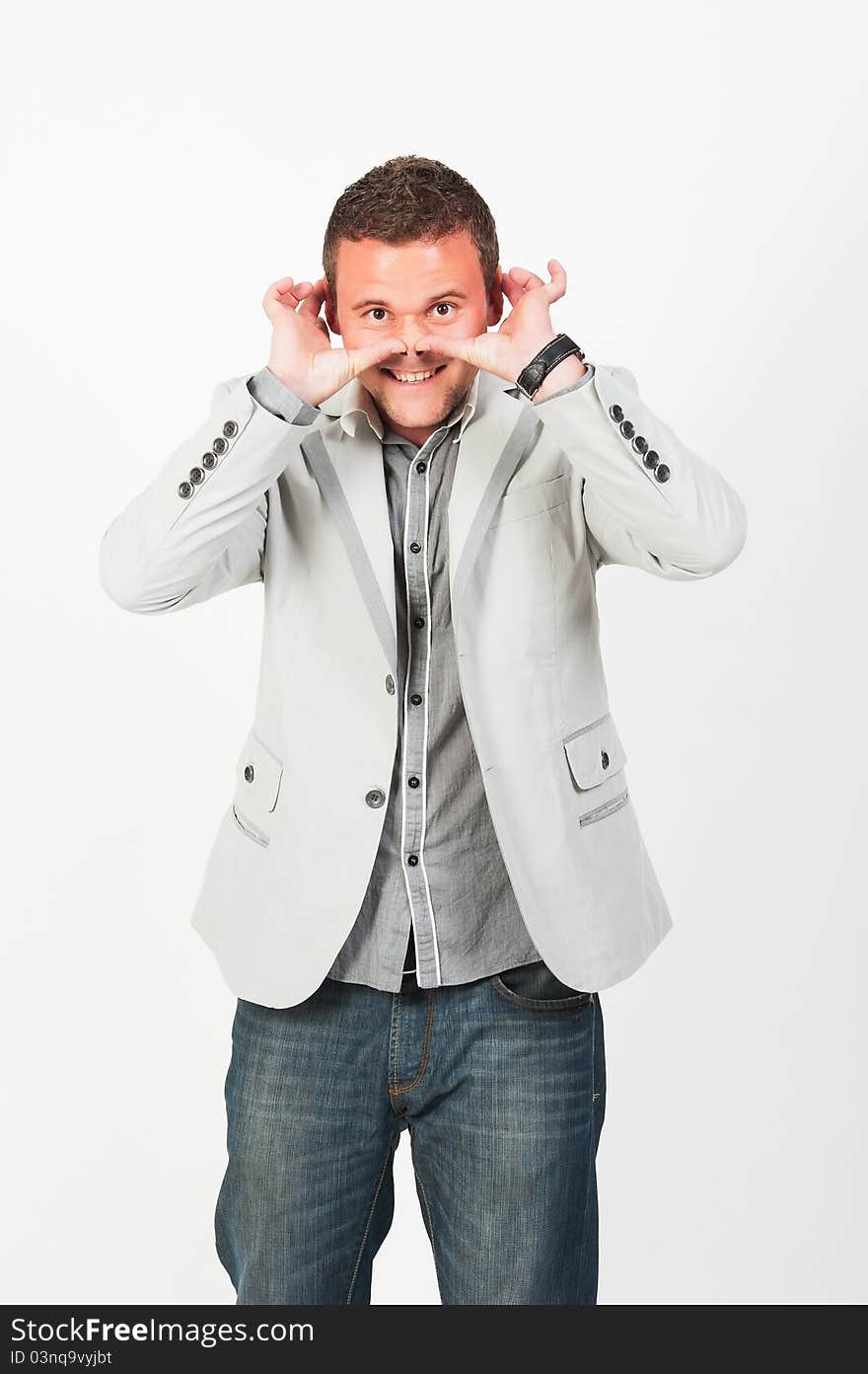 Very happy successful gesturing businessman, isolated on white background