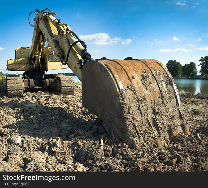 Digger, Heavy Duty construction equipment parked at work site