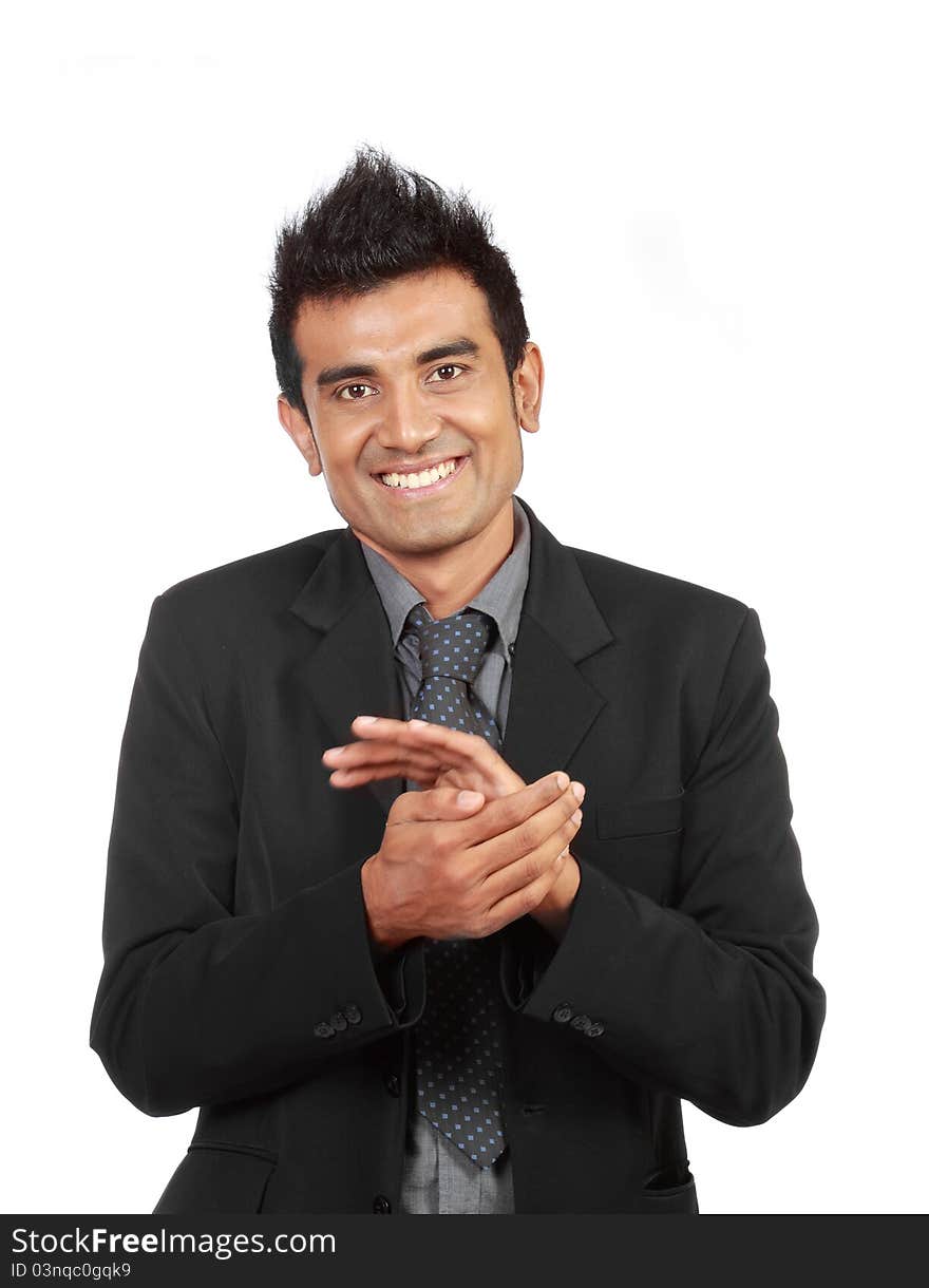 Young modern businessman clapping