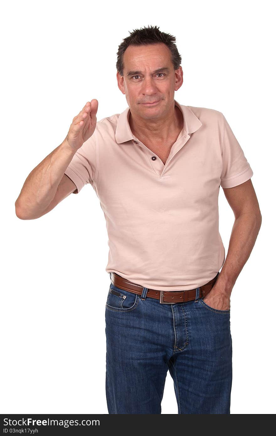 Attractive Smiling Middle Age Man Pointing Forwards with Hand in Pocket. Attractive Smiling Middle Age Man Pointing Forwards with Hand in Pocket