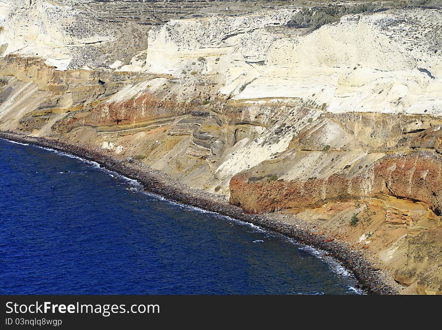 Greek shore line in Santorini, detail of the Red Beach